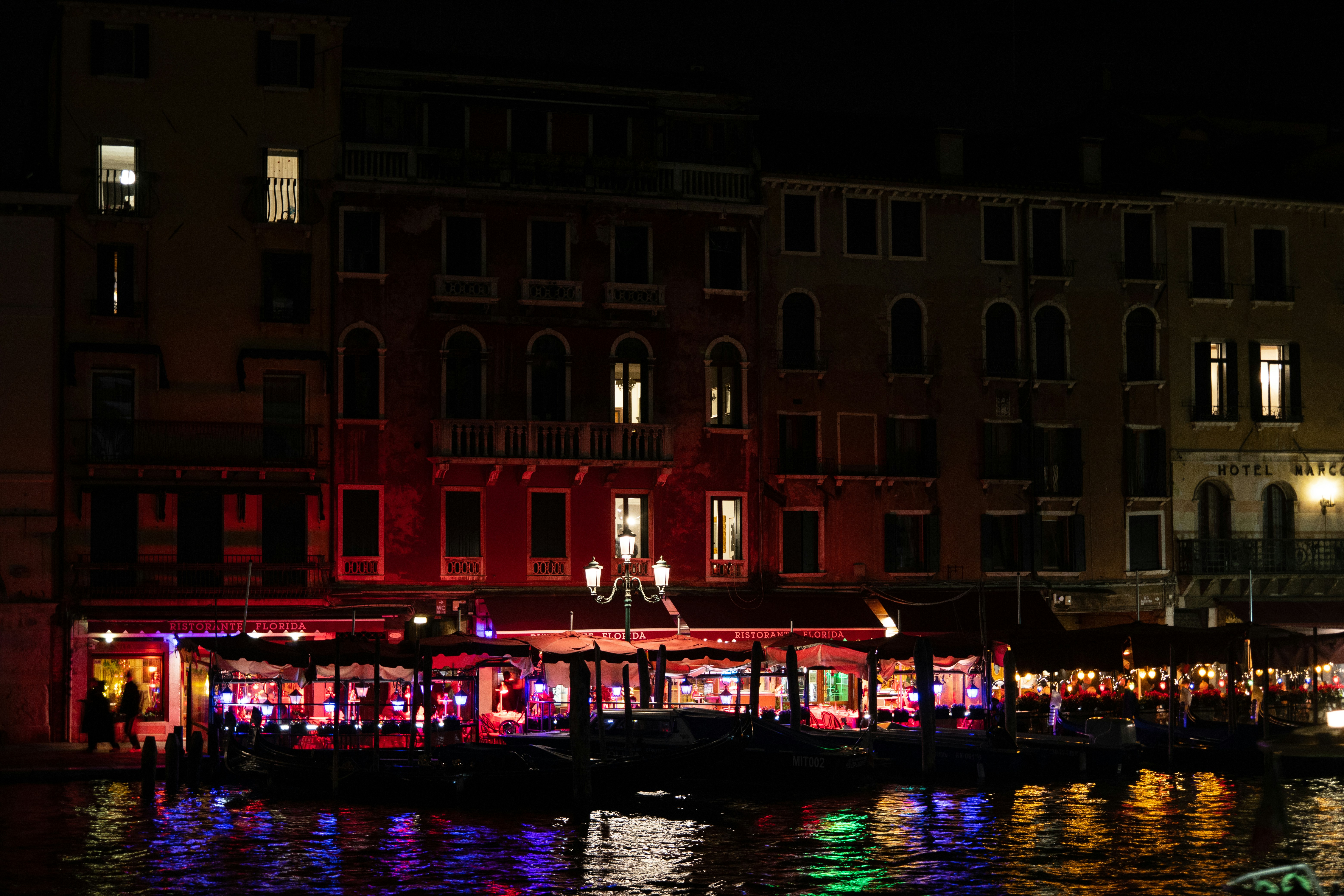 a boat in a body of water at night