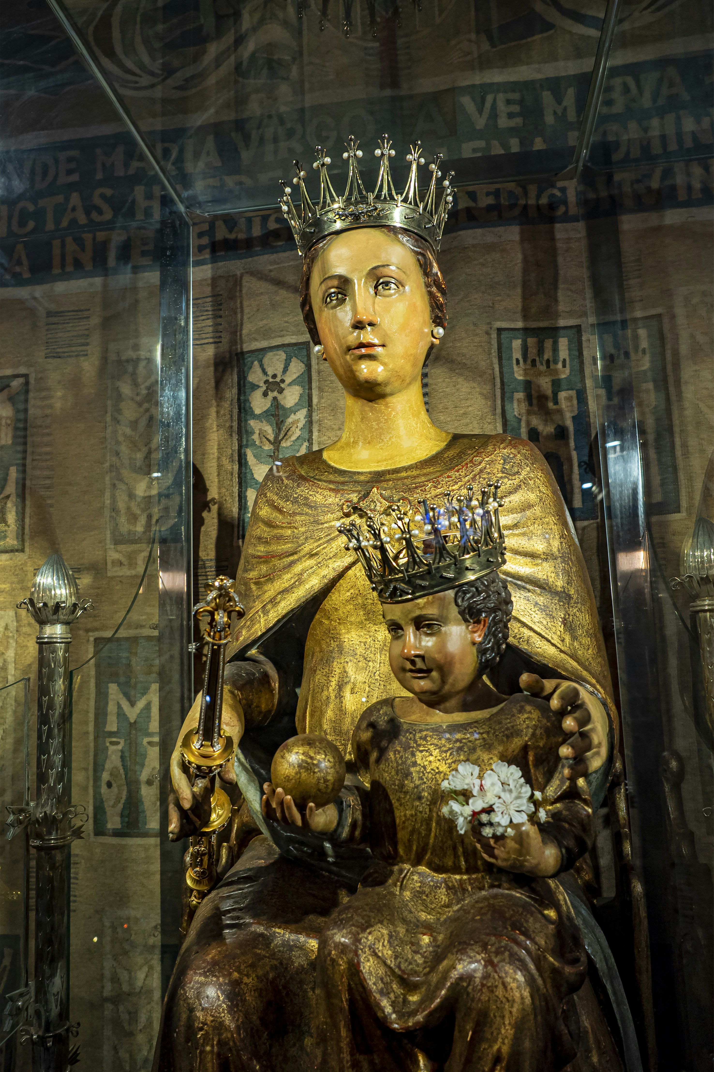 a statue of a woman holding a child