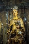 a statue of a woman holding a child