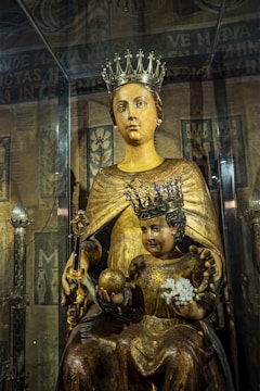 a statue of a woman holding a child