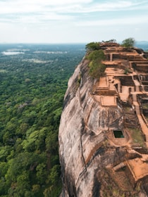 a view of a cliff with a building on top of it
