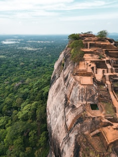 a view of a cliff with a building on top of it