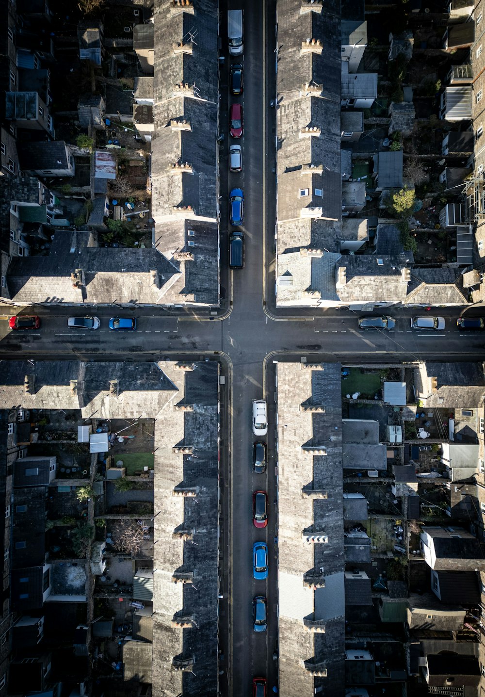 an aerial view of a street intersection in a city