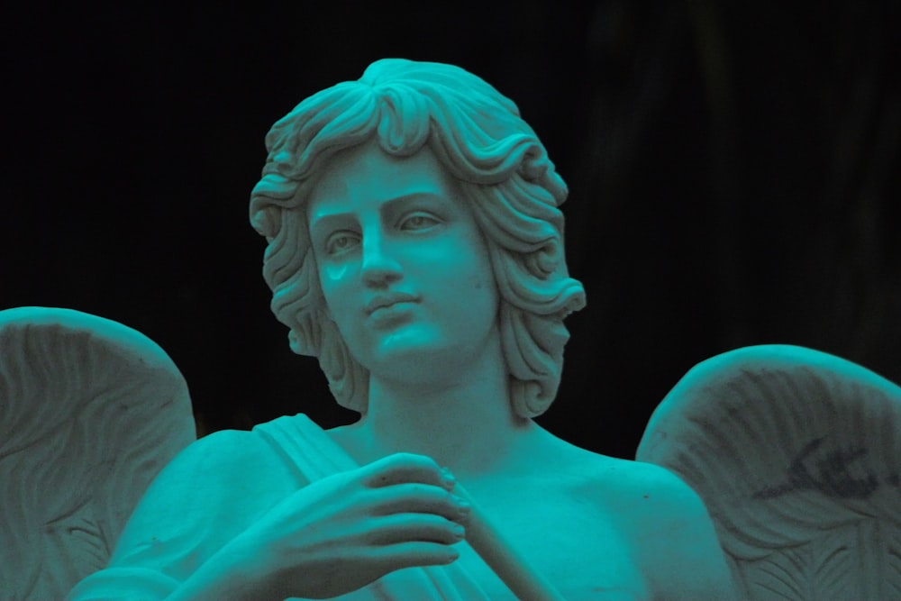 a close up of a statue of an angel