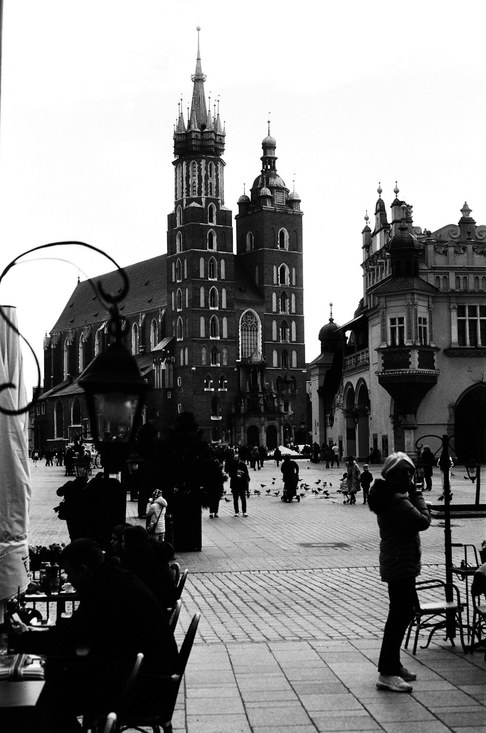 a black and white photo of a town square