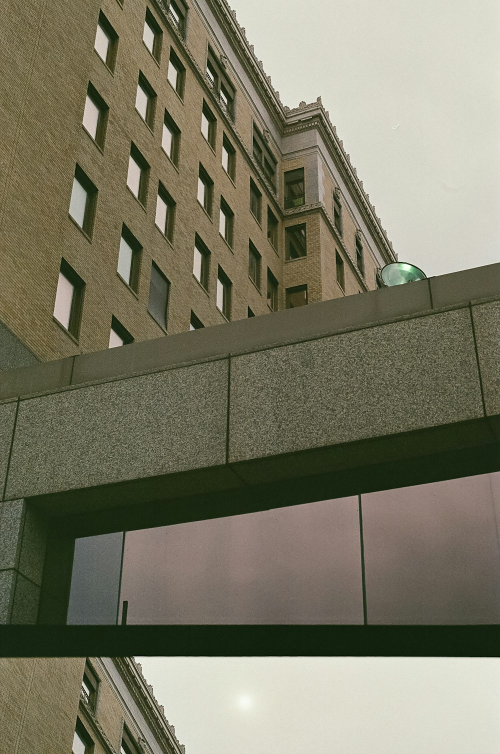 a tall building with a clock on the top of it