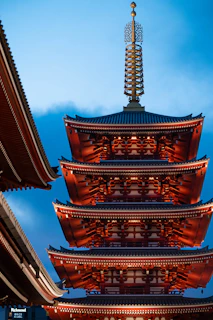 a tall tower with a sky in the background
