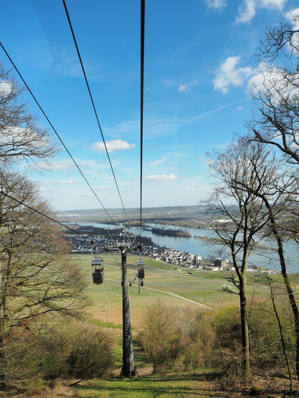 a view of a lake from a ski lift