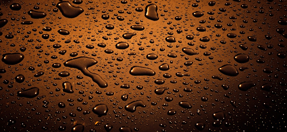 drops of water on a dark surface