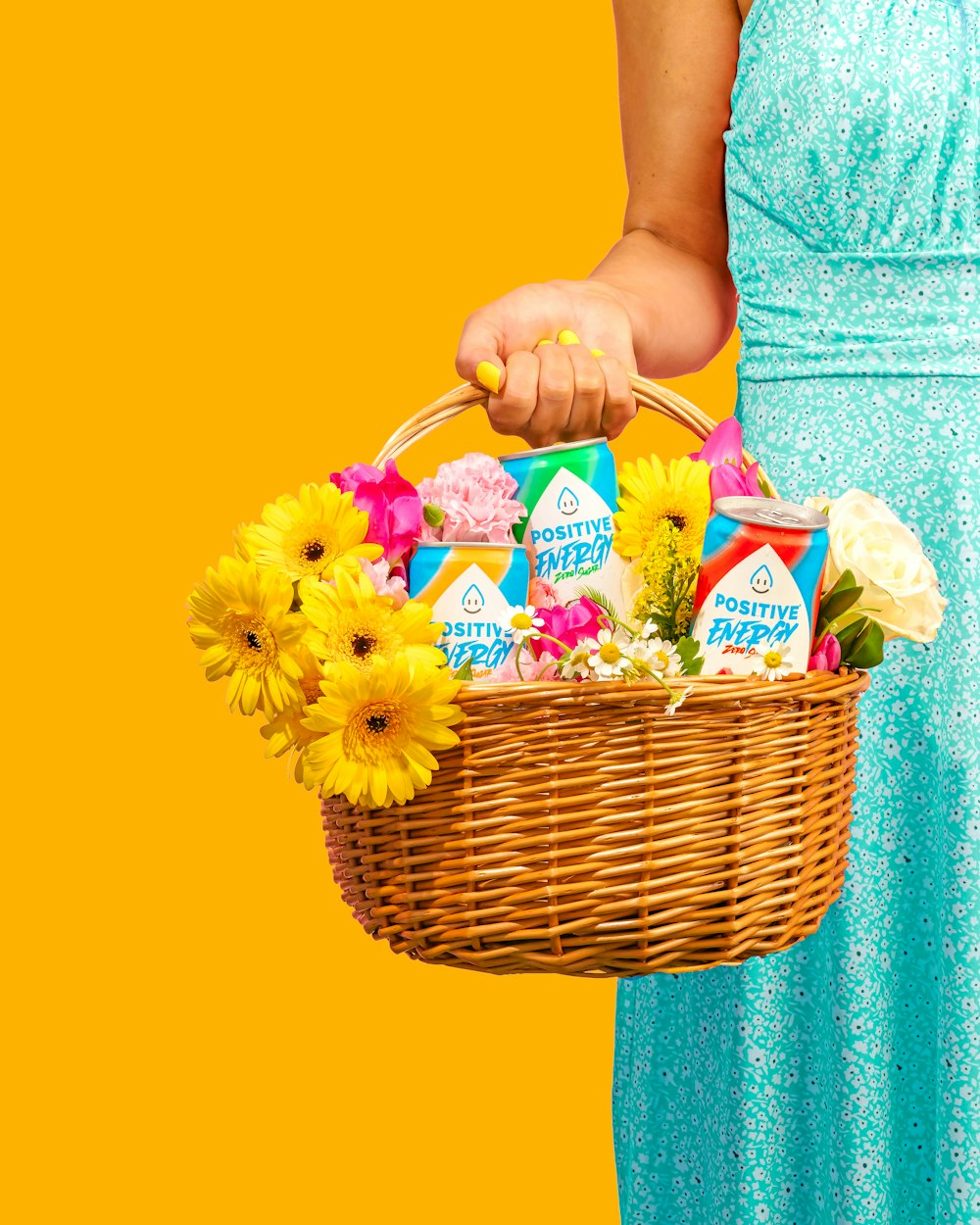 a woman in a blue dress holding a basket of flowers