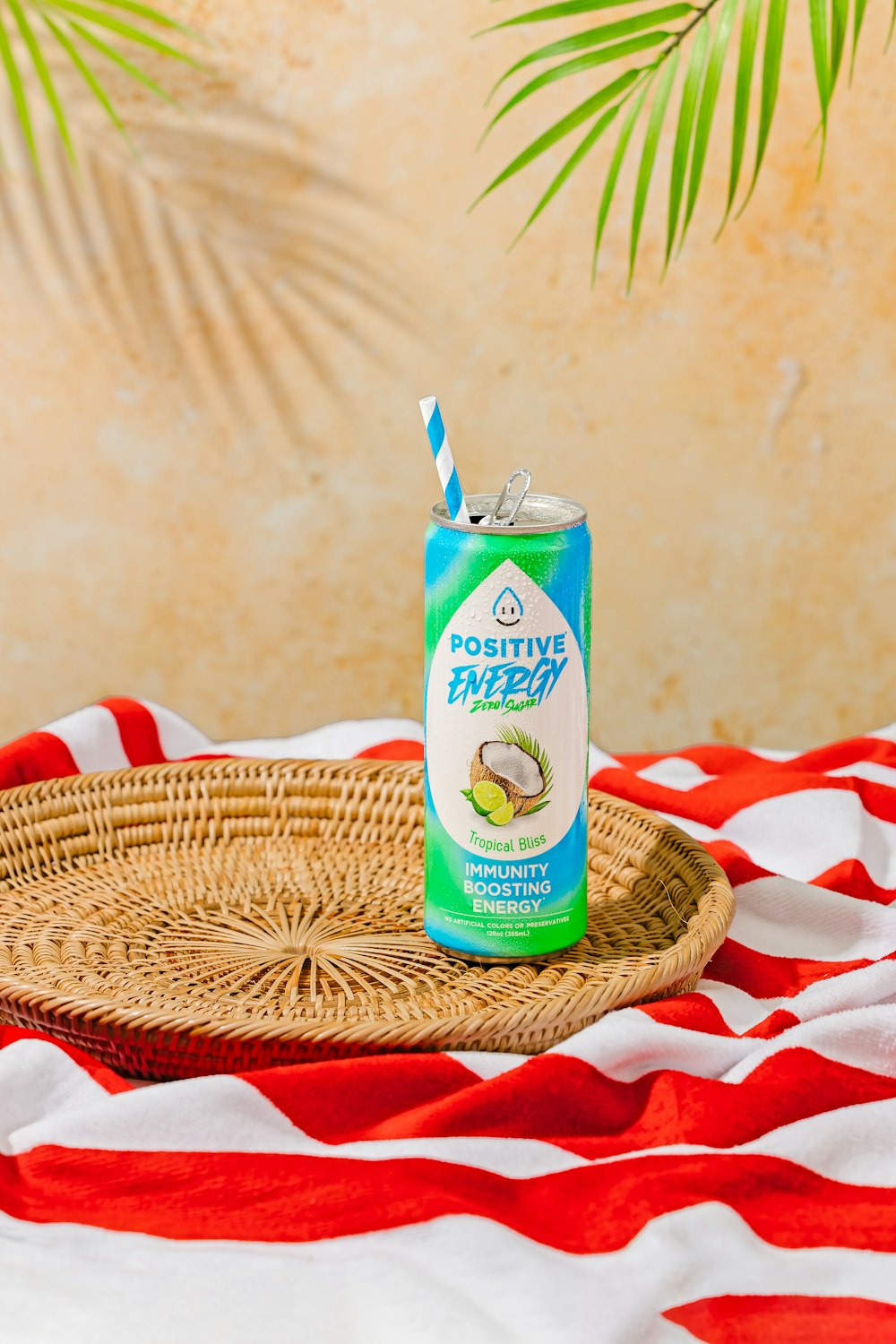 a can of coconut juice sitting on top of a wicker tray