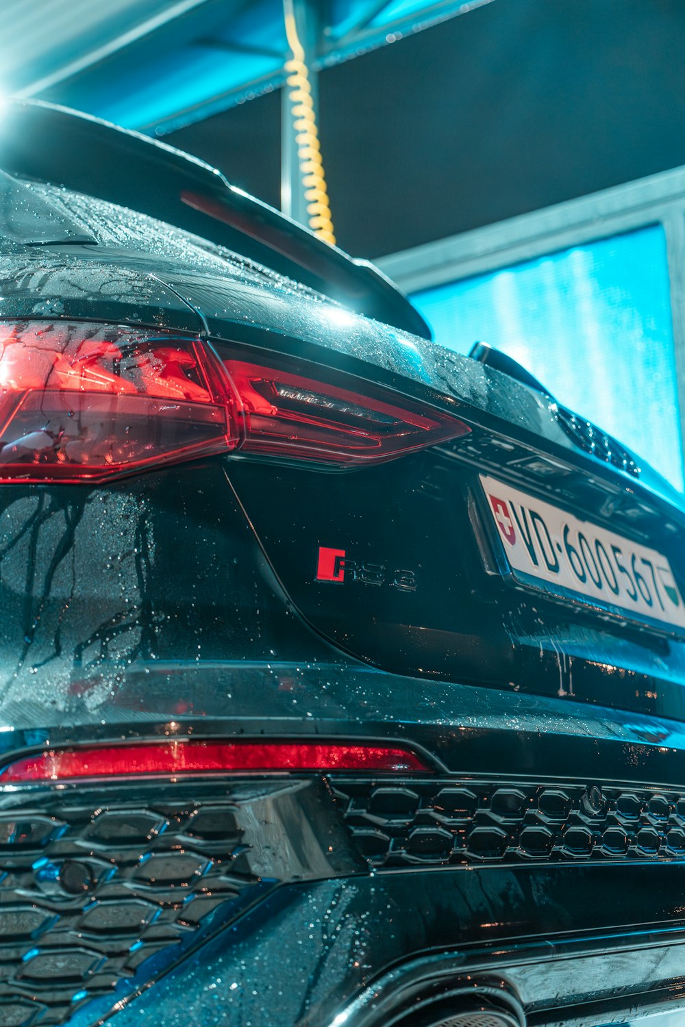 a close up of a car with a lot of water on it