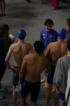 a group of young men standing next to each other