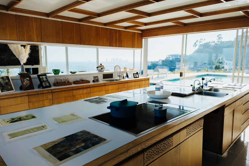 a kitchen with a sink and a stove top oven