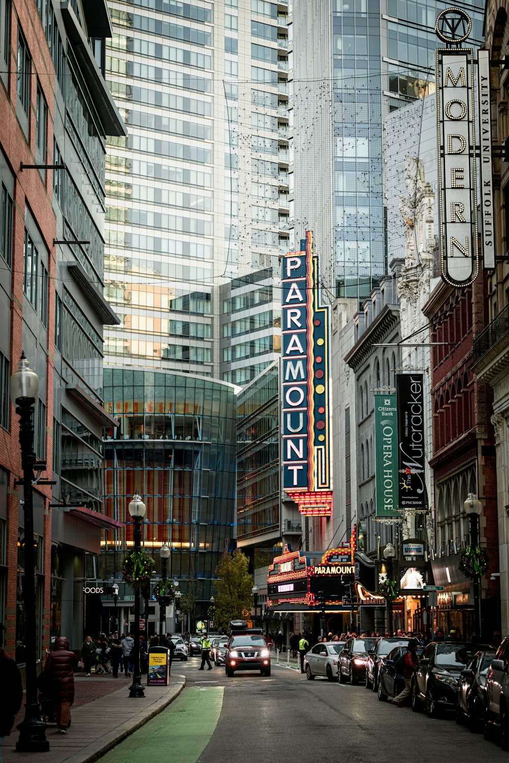 a city street filled with lots of tall buildings