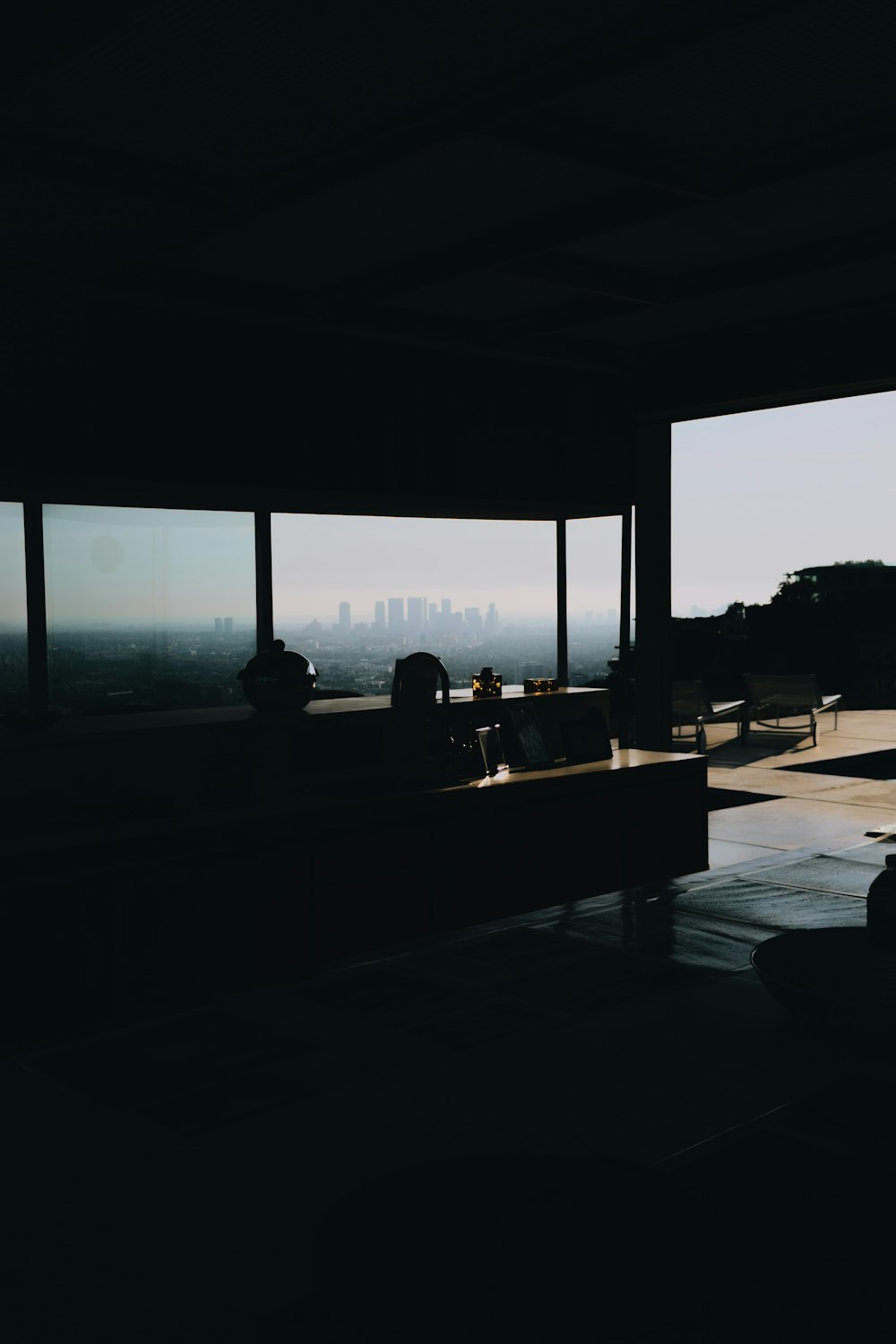 a living room with a view of the city