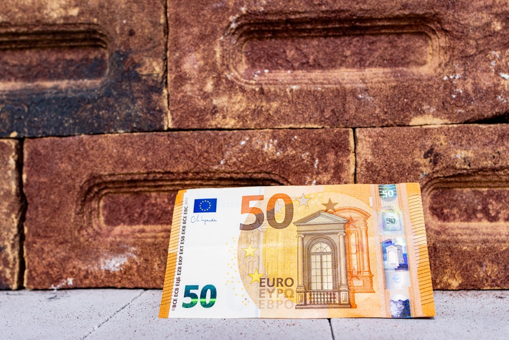 a 50 euro bill laying on the ground