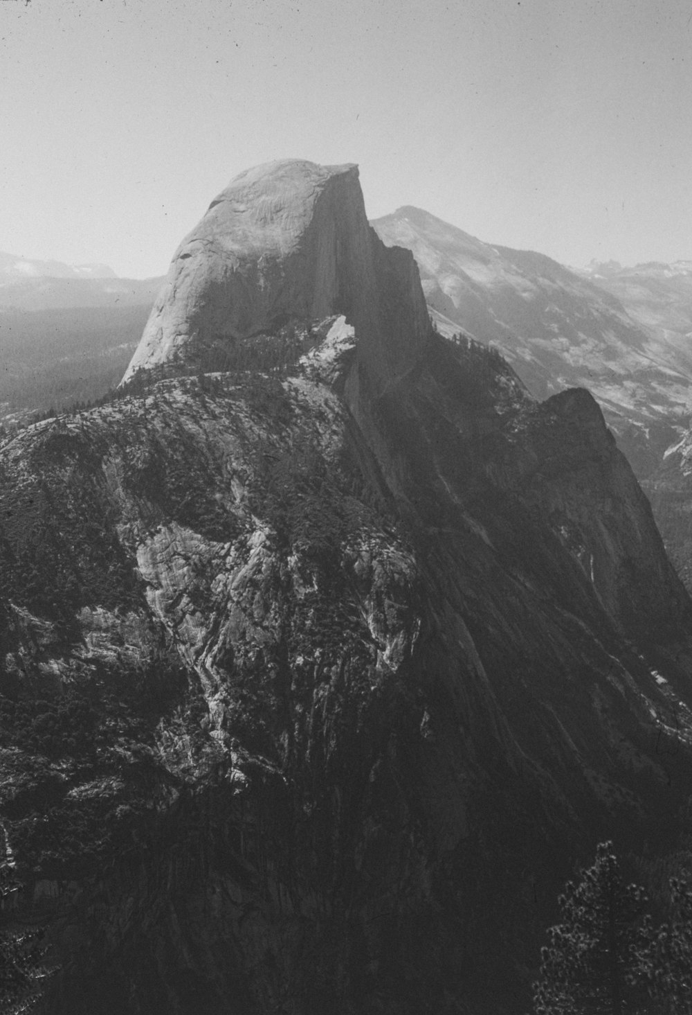 a black and white photo of a mountain