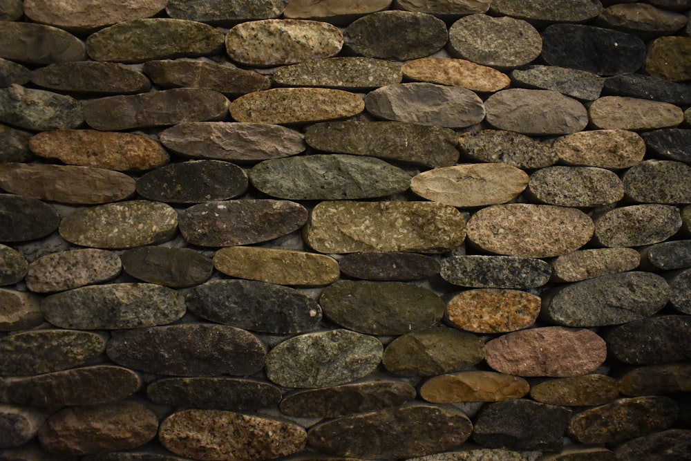 a stone wall made of rocks and gravel