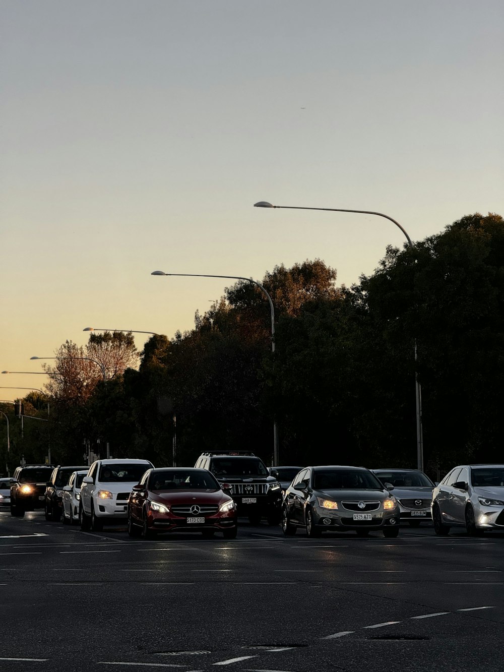 a parking lot filled with lots of parked cars