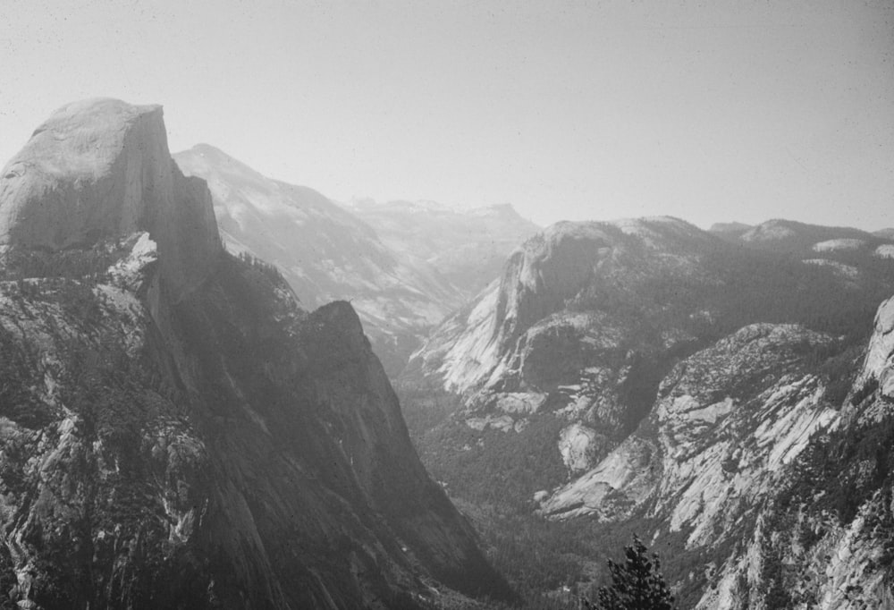 a black and white photo of a mountain range