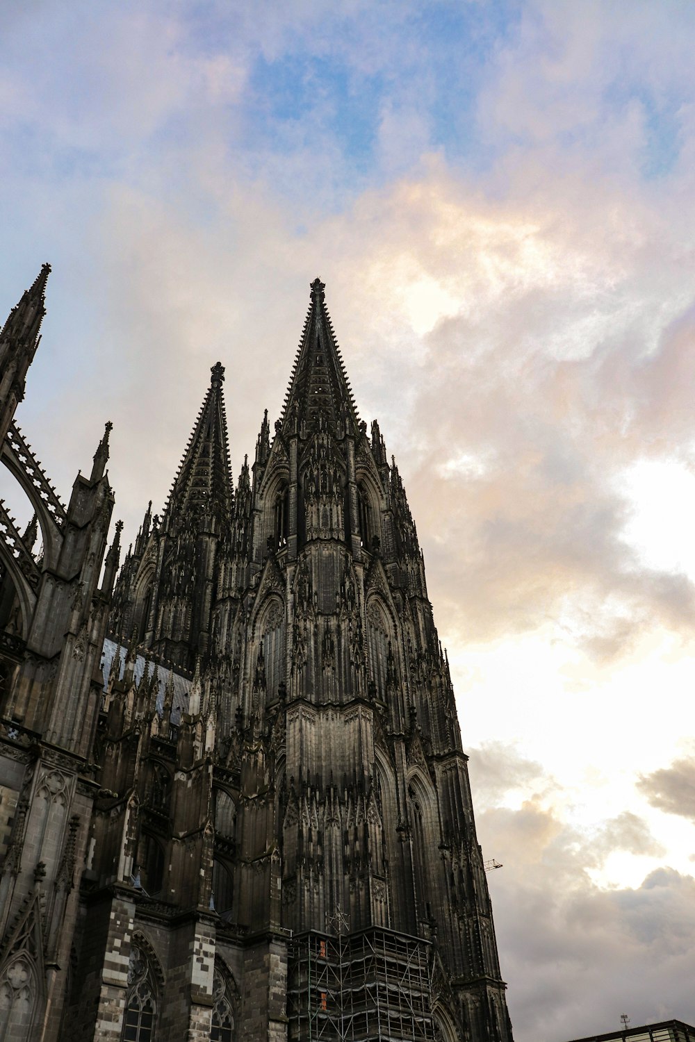 a large cathedral with a clock on the front of it