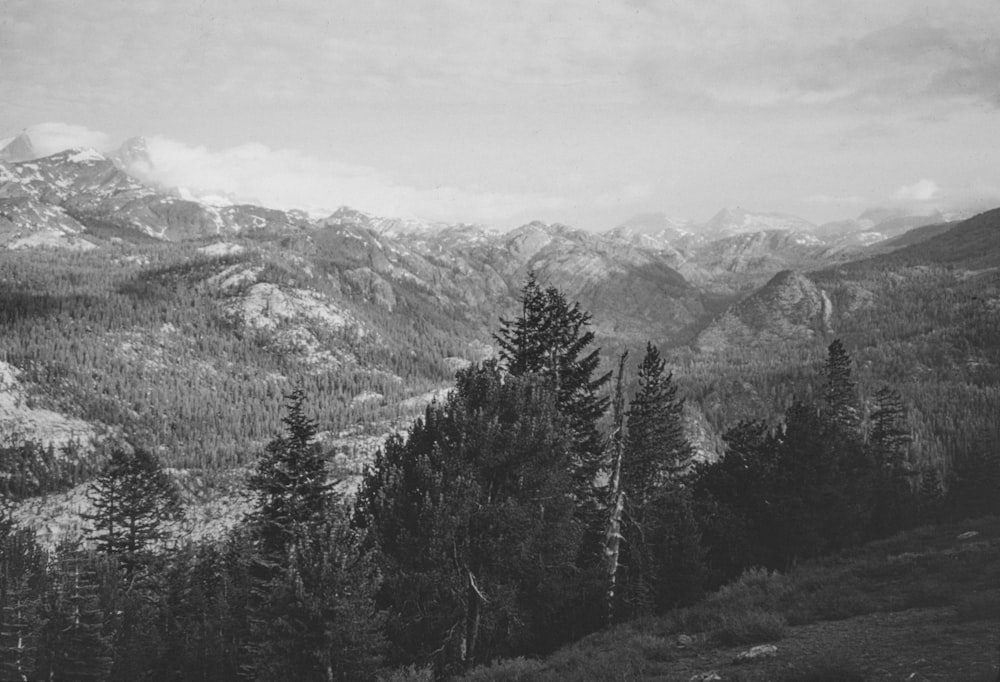 a black and white photo of a mountain range