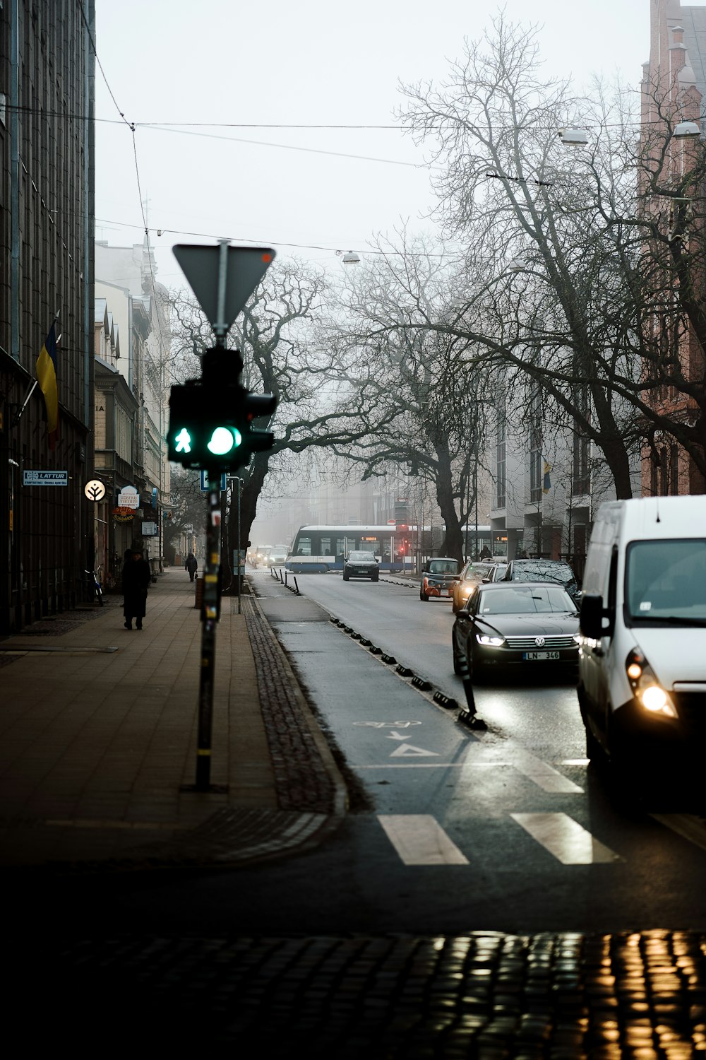 a traffic light sitting on the side of a road