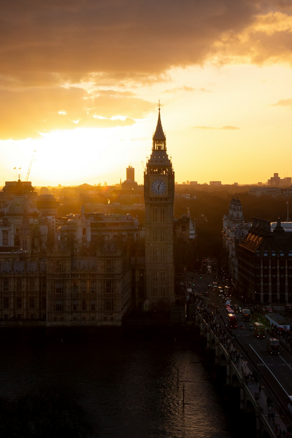 the sun is setting over the city of london