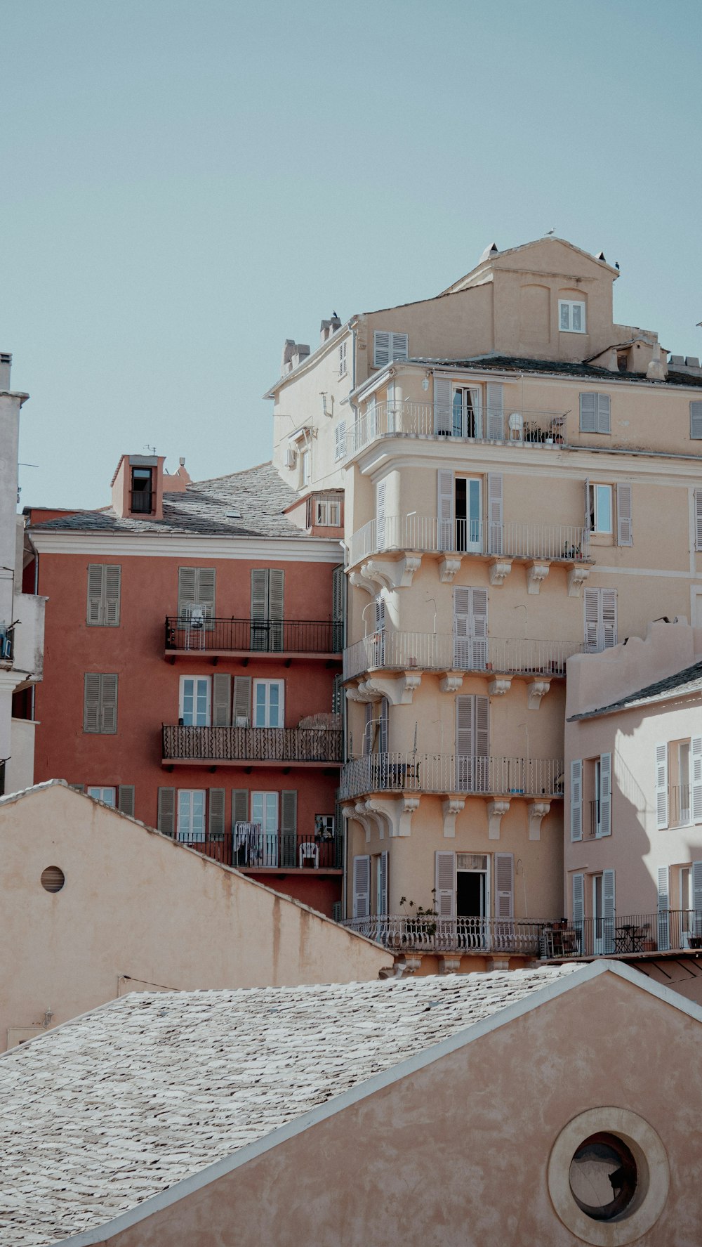 a building with balconies and balconies on top of it