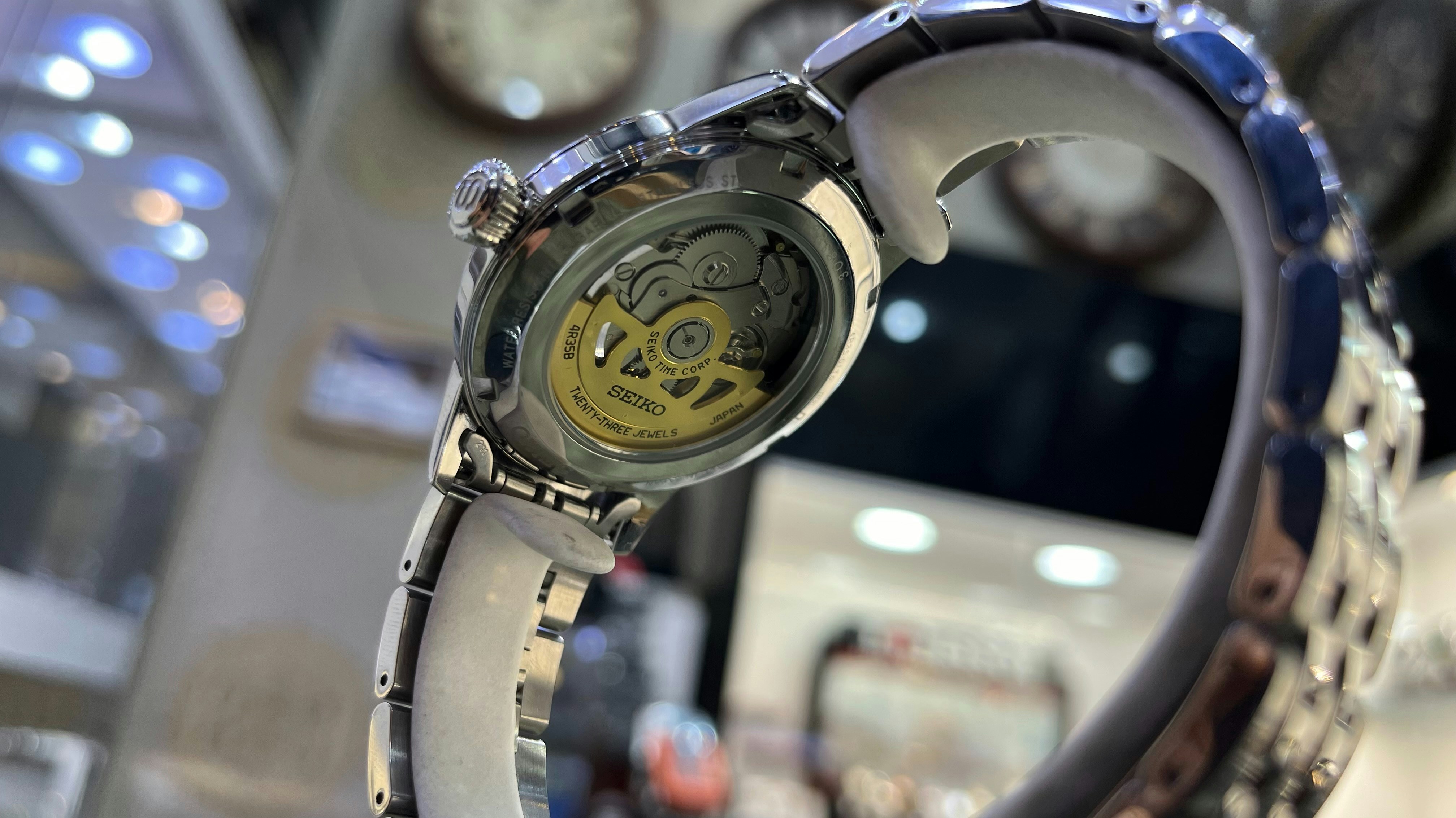 a close up of a watch on a display