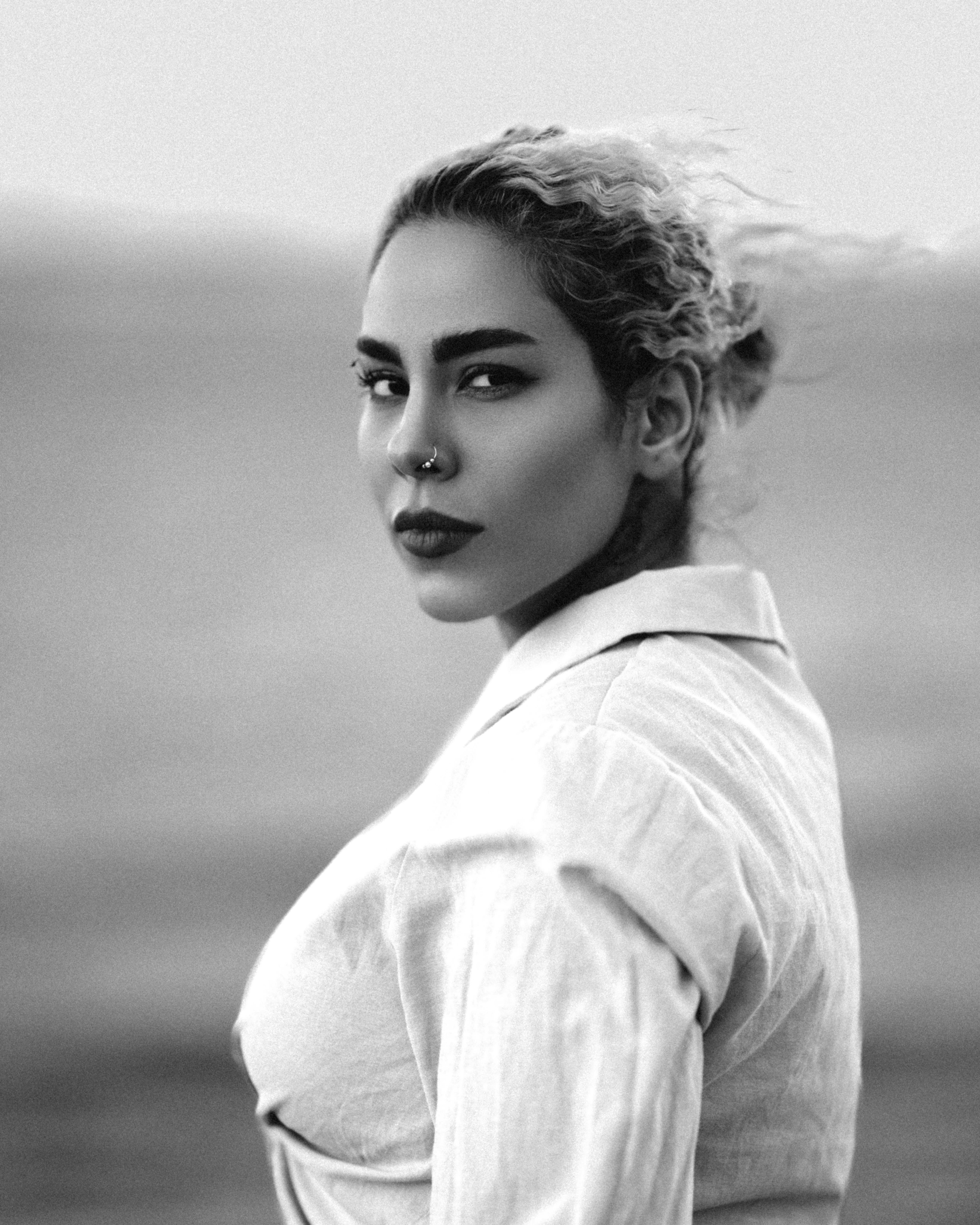 a black and white photo of a woman