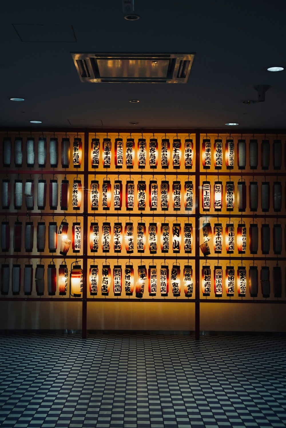 a room filled with lots of bottles of liquor