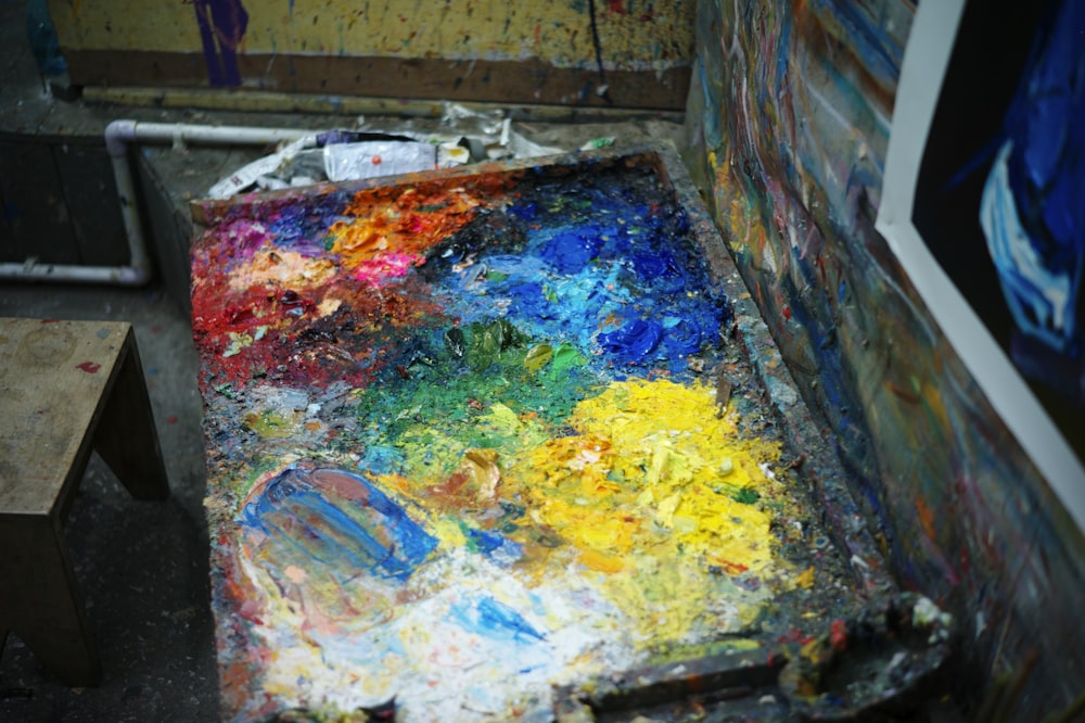 a painting is being displayed in an art studio