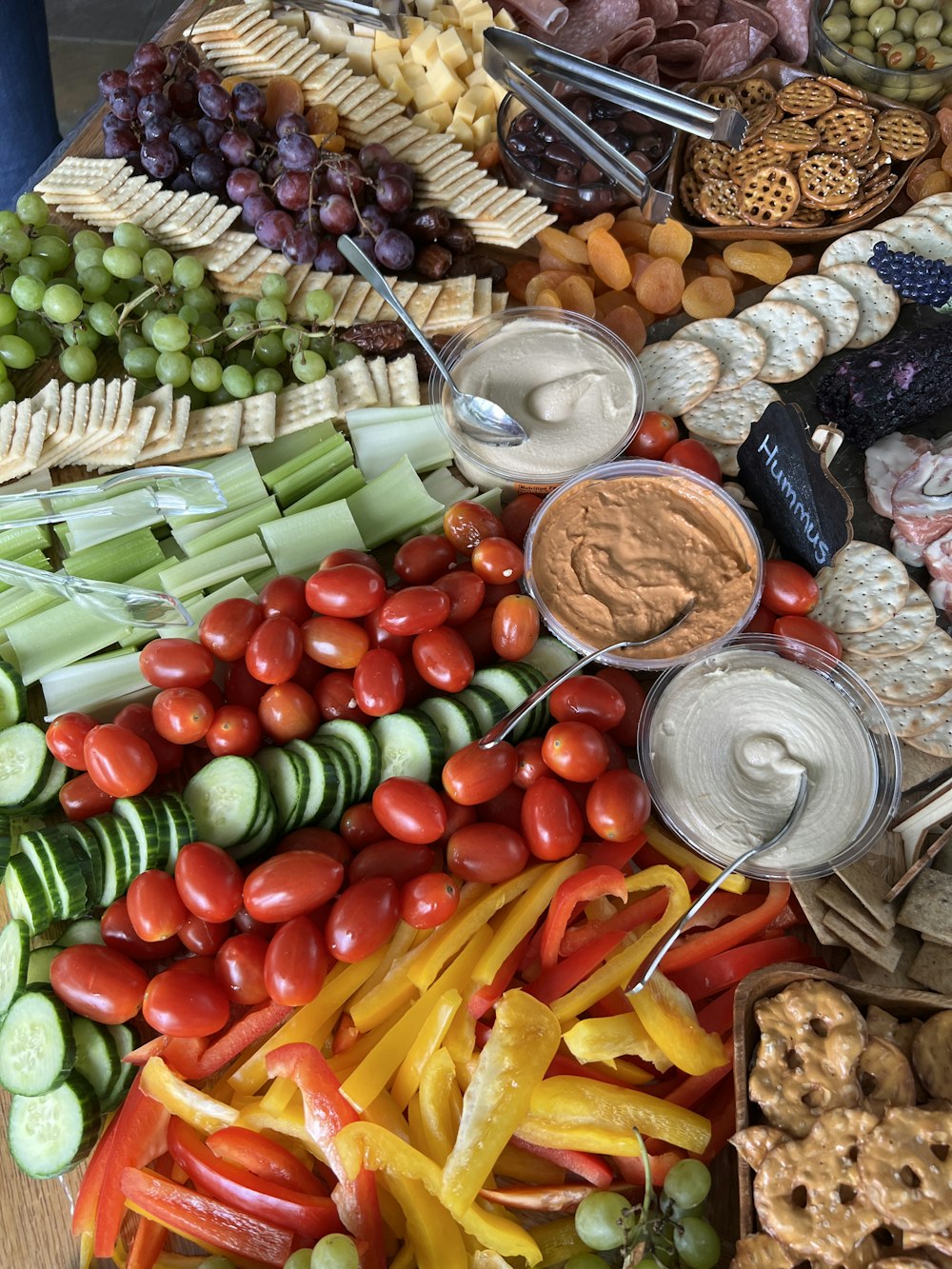 a variety of food is arranged on a table