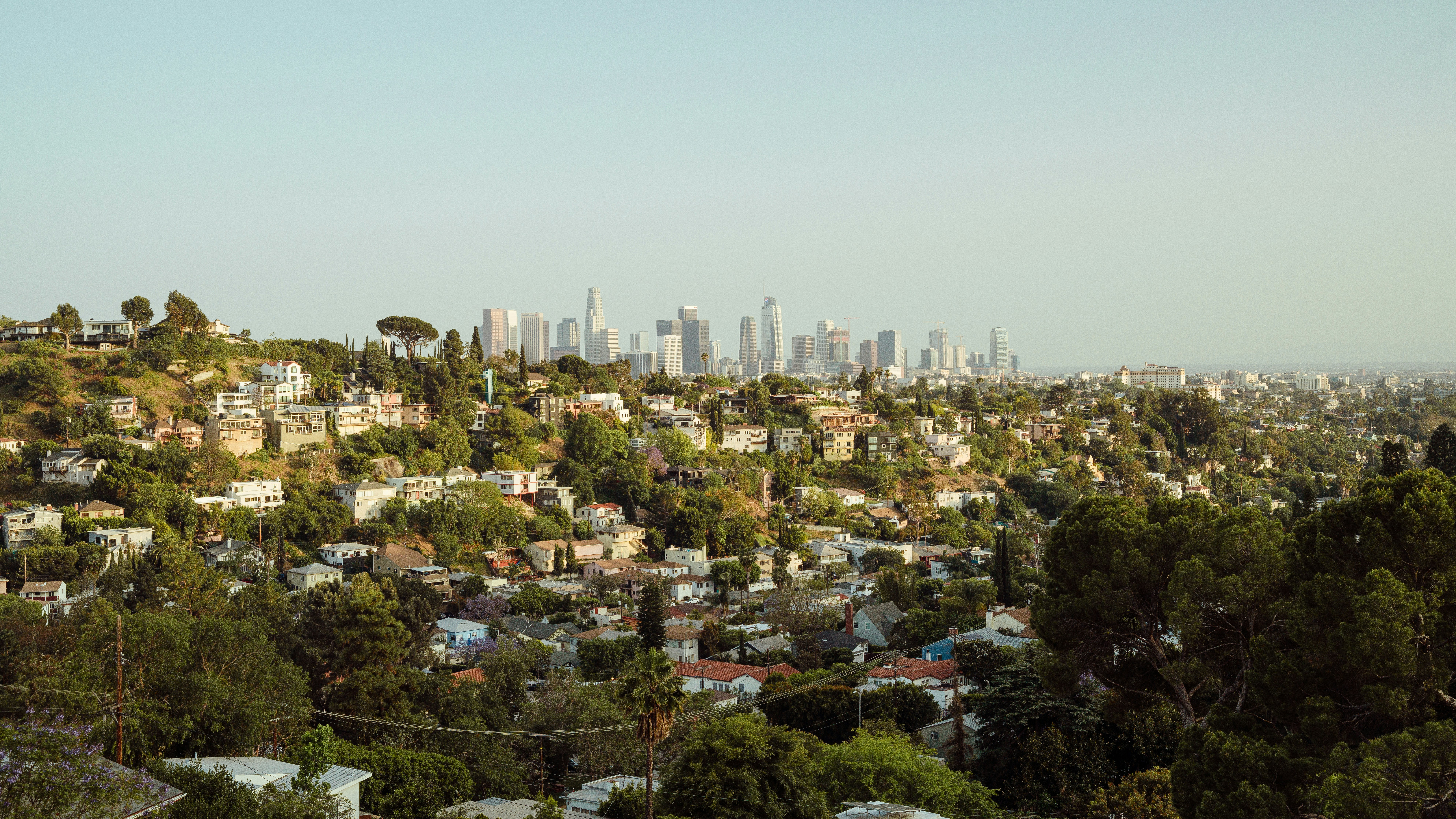 a view of a city from the top of a hill