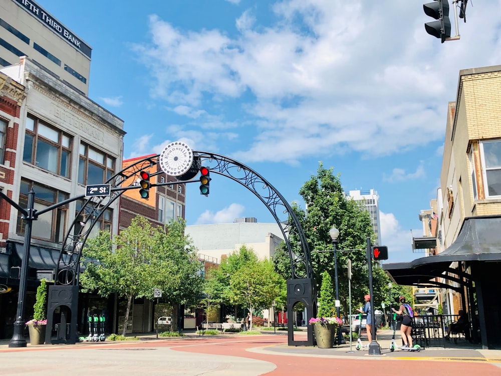 a street with a clock on the top of it