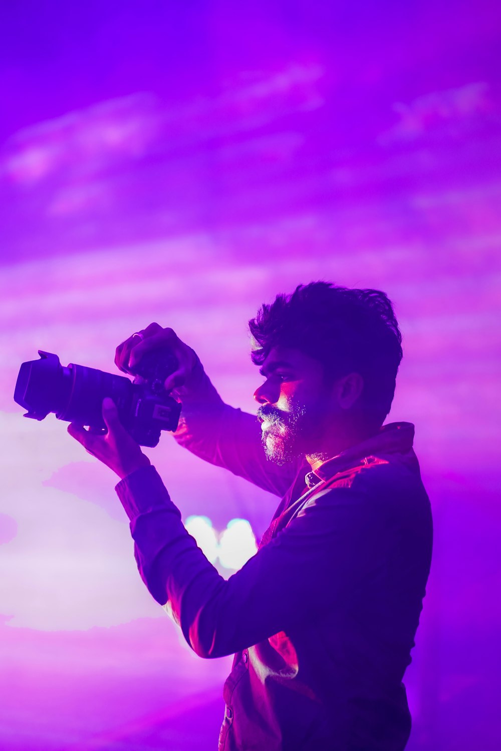 a man taking a picture with a camera