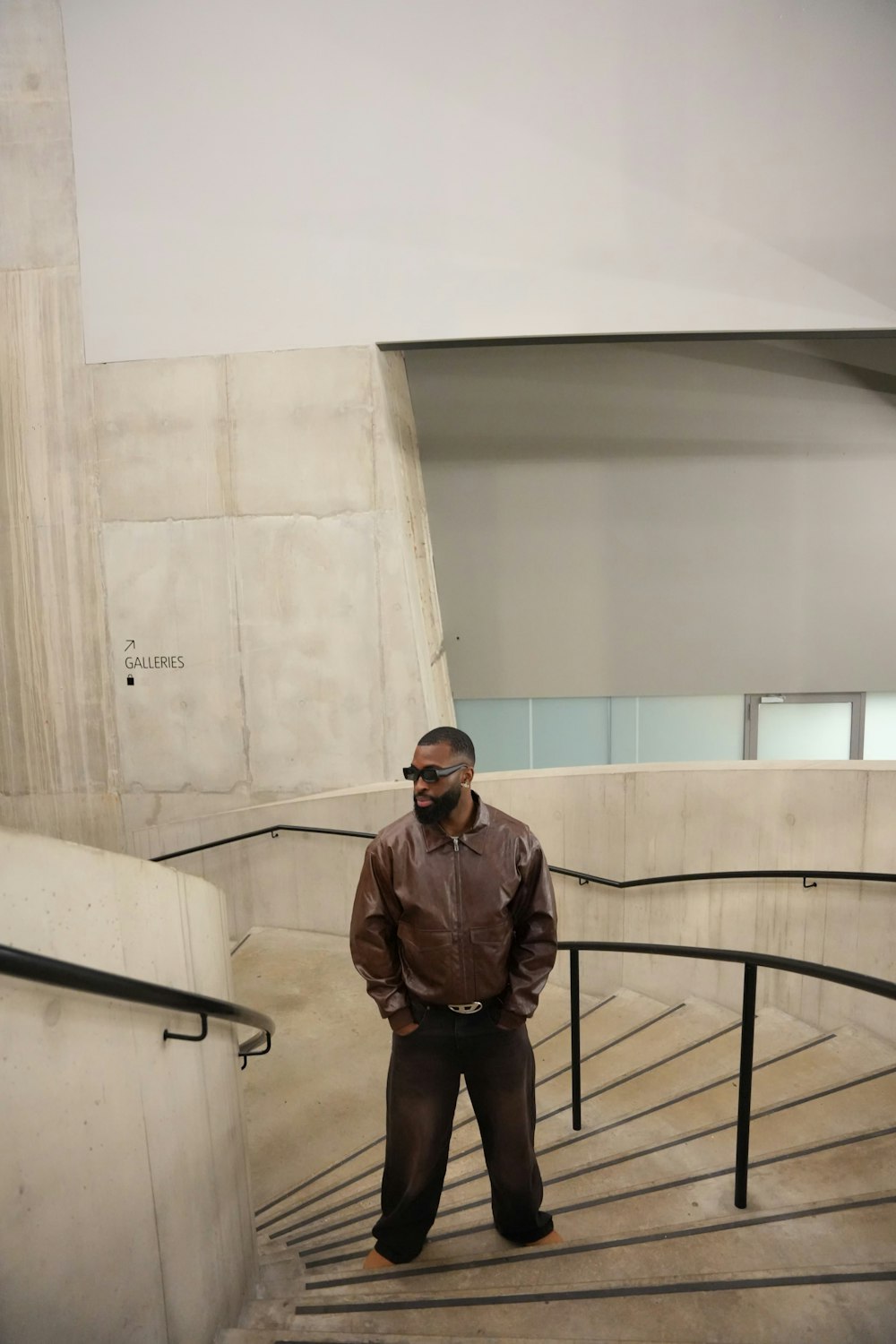 a man standing on a set of stairs