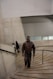 a man walking down a flight of stairs