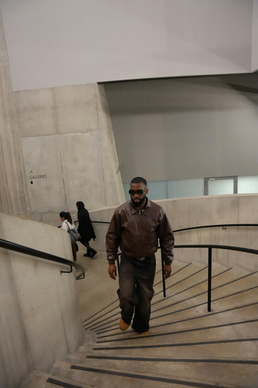 a man walking down a flight of stairs