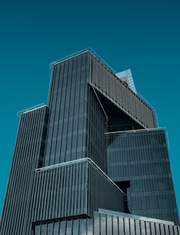 a very tall building with a clock on it's side