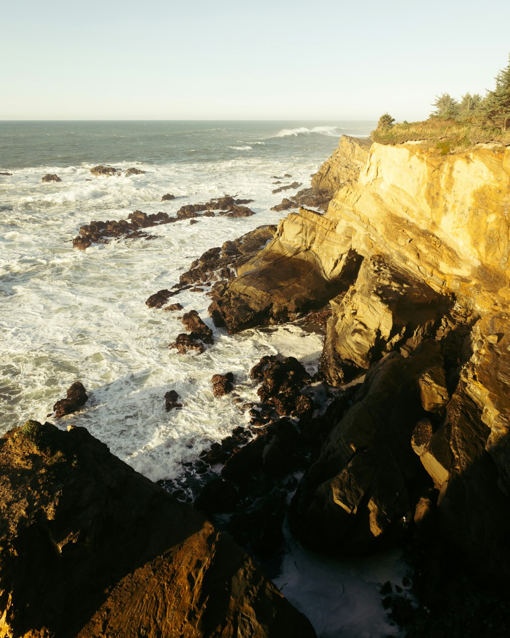 a view of the ocean from a cliff