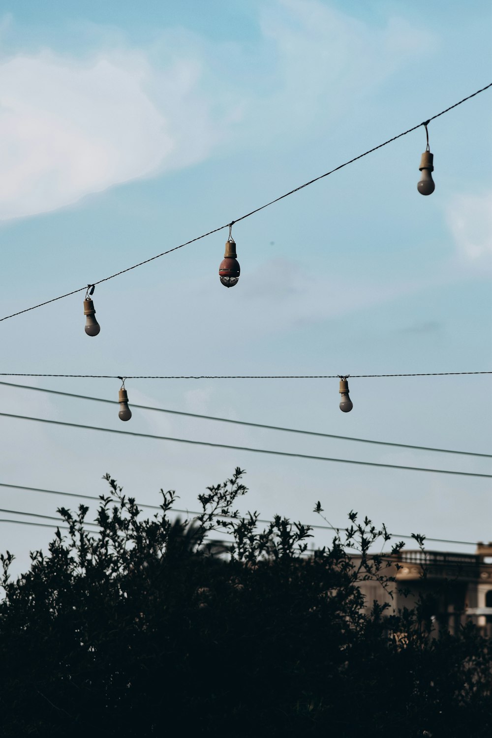 a bunch of wires that are hanging in the air