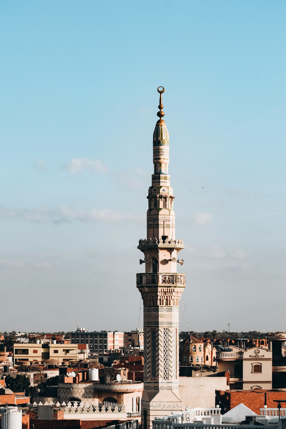 a tall tower with a clock on top of it