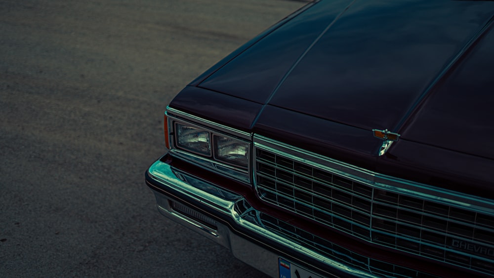 a close up of the front of a black car