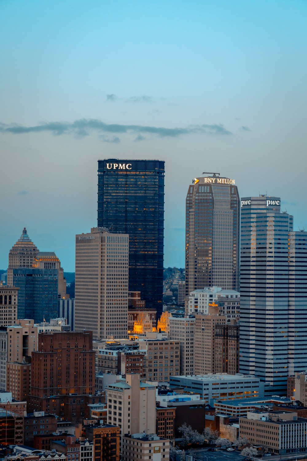 a view of a city with tall buildings