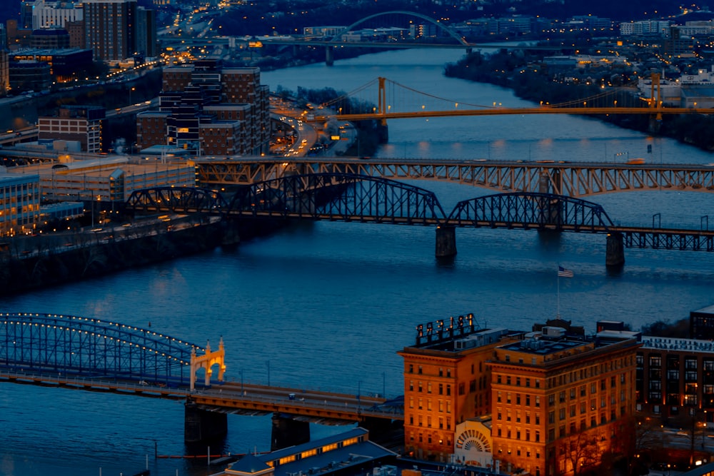 a view of a city and a bridge at night