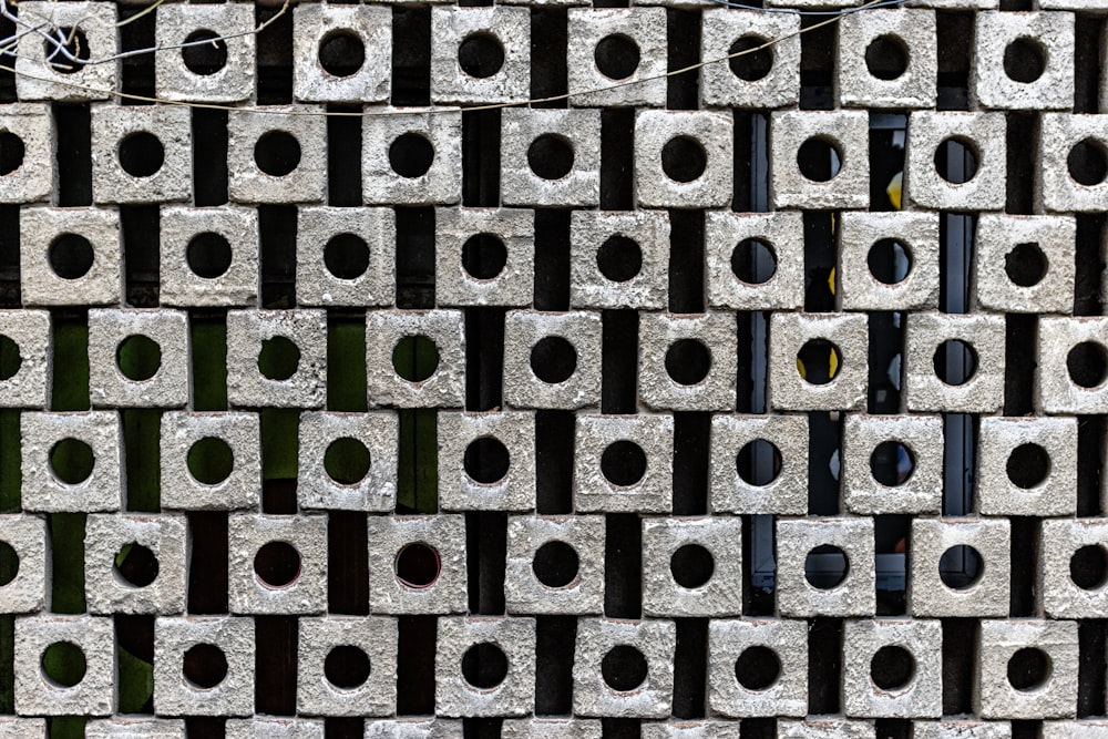 a close up of a wall made of concrete blocks