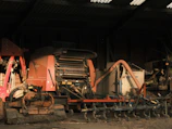 a large machine that is sitting in the dirt